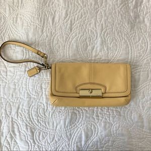 COACH Leather Fold over Wristlet Clutch in soft yellow - card slots inside